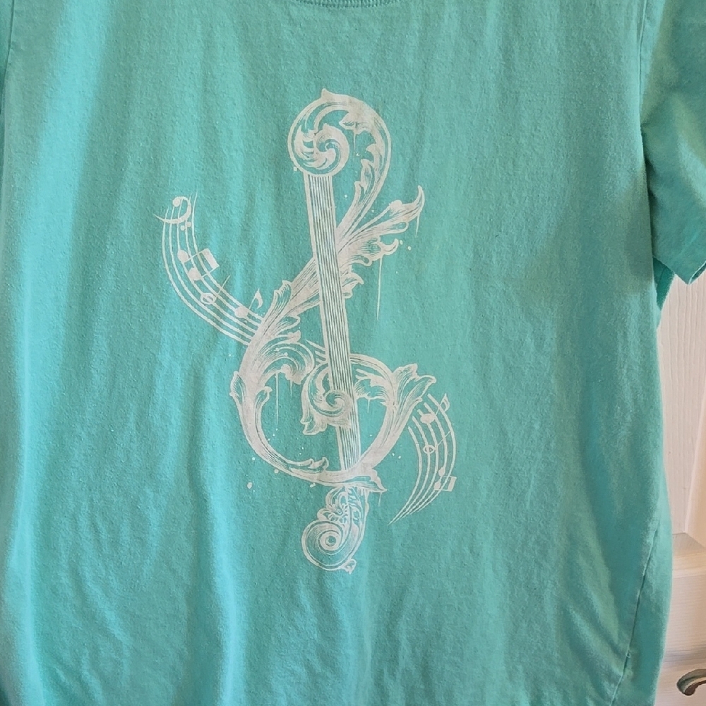 Torrid Teal Treble Clef size 2